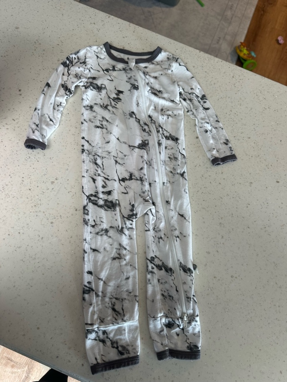 Kyte BABY White and Black Marble Print Footie One-Piece